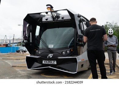 Manchester UK, July 24, 2022. Aurrigo Self Driving Auto-shuttle Trial At Etihad Campus. Driverless Bus With Text Centre For Connected And Autonomous Vehicles. 