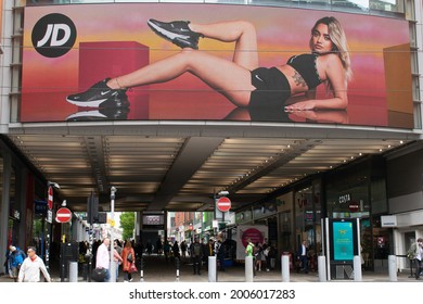 Manchester, UK. July 7, 2021. Advert For JD Sport With Woman In Sports Gear. Market Street Arndale.