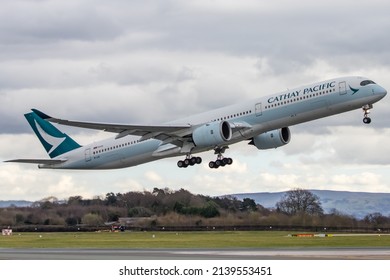 Manchester, UK - March, 17, 2022. Cathy Pacific A350 Leaving `Manchester Airport 