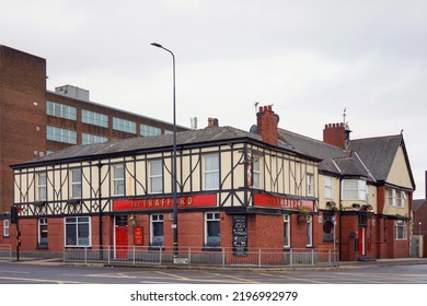 Manchester, UK - Nov 2016: Exterior Of The Trafford Pub At Chester Road Near The Old Trafford Stadium With Cloudy Sky Background. No People.