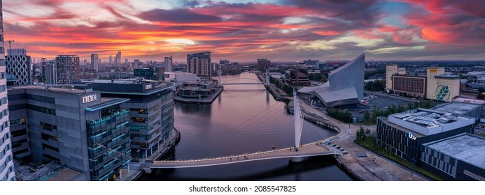Manchester, UK. September 13, 2021. Aerial view of the Media City UK is on the banks of the Manchester Ship Canal in Salford and Trafford, Greater Manchester, England at dusk.