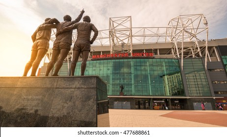 MANCHESTER, UNITED KINGDOM -22 APRIL 2016: The Old Trafford stadium with wam sunlight taken during sunset. Old Trafford is the home stadium of Manchester United Football Club since 1910.