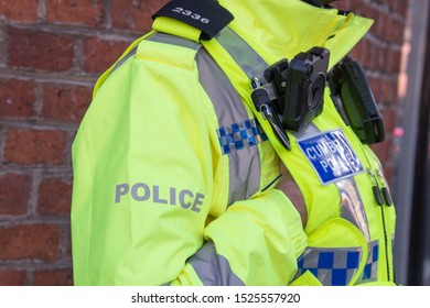 Manchester, United Kingdom - 2nd Oct 2019: British Police Officers Hi Vis Uniform With A Body Cam & And Radio.