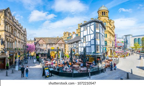 MANCHESTER, UNITED KINGDOM, APRIL 11, 2017: Restaurants full of people on the Shambles square in Manchester, England