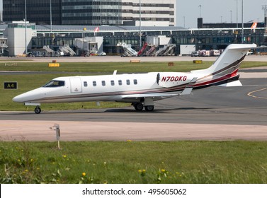 Manchester, United Kingdom - May 08, 2016: Private Bombardier Learjet 45 mid-size business jet aircraft (N700KG) taxiing on Manchester International Airport tarmac.