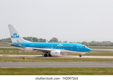 Manchester, United Kingdom - May 11, 2017: Royal Dutch Airlines KLM Boeing 737-7K2 passenger plane (PH-BGE, "Ortolan Bunting") taxiing on Manchester International Airport tarmac.
