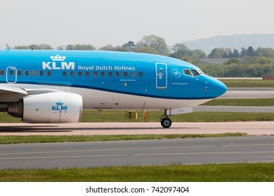 Manchester, United Kingdom - May 11, 2017: Royal Dutch Airlines KLM Boeing 737-7K2 passenger plane (PH-BGE, "Ortolan Bunting") taxiing on Manchester International Airport tarmac.