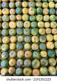 Mandarin Oranges Or Tangerines Fruit For Sale In Local Vegetables Market. Wholesale Depot Of Exotic Fruits. Local Produce At The Farmers Market.