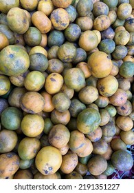 Mandarin Oranges Or Tangerines Fruit For Sale In Local Vegetables Market. Wholesale Depot Of Exotic Fruits. Local Produce At The Farmers Market.