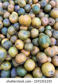 Mandarin Oranges Or Tangerines Fruit For Sale In Local Vegetables Market. Wholesale Depot Of Exotic Fruits. Local Produce At The Farmers Market.