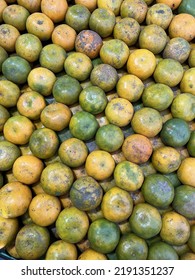 Mandarin Oranges Or Tangerines Fruit For Sale In Local Vegetables Market. Wholesale Depot Of Exotic Fruits. Local Produce At The Farmers Market.