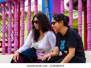 Mandarmani, West Bengal, India.- February, 19, 2021. Two Unidentified beautiful Indian Ladies Laughing and enjoying together.