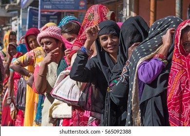 MANDAWA - DEC 22: People Standing In Long Queue In Front Of Bank On 22 December 2016 In Mandawa, India. Demonetization Of Indian 500 And 1000 Rupee Notes Caused Long Queues All Over India. 