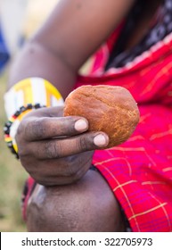 Mandazi, African Doughnut Held By A Maasai Warrior.