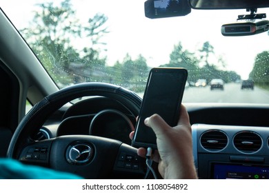 Mandeville, Louisiana USA - 6/6/18 : Texting While Driving