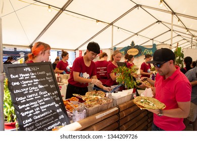 Mandurah, Western Australia/ Australia - March 16 2019:  People Ordering delicious food from a market stall.