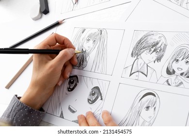 Manga style. The artist draws sketches of anime comics. Storyboard of characters on paper.
