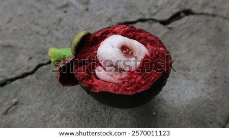 mangis fruit split and lying on the floor