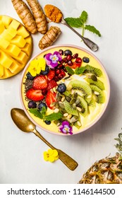 Mango Banana Pineapple Turmeric Smoothie Bowl