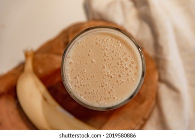 Mango And Banana Smoothie. Smoothie Served In A Bowl With White Bottom.