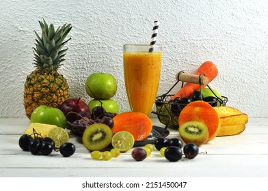 Mango And Carrot Juice. Color Juice. Mixed Juice. Made From Mango, Apple, Guava, Carrot, Pineapple And Orange. Served In A Glass. Selective Focus