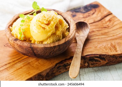 Mango Ice Cream Sorbet In Olive Wood Bowl