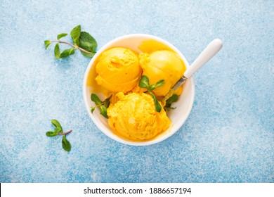 Mango Ice Cream, Sorbet In A Plate On A Concrete Background, Top View