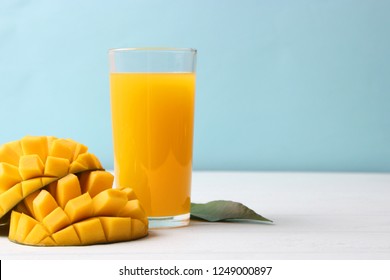 Mango Juice In A Glass And Mango Fruit.
