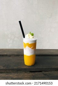 Mango Juice With Vanilla Ice Cream On Top