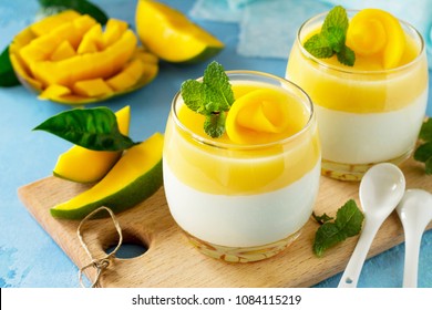 Mango Panna cotta with mango jelly and mint, Italian dessert, homemade cuisine. - Powered by Shutterstock