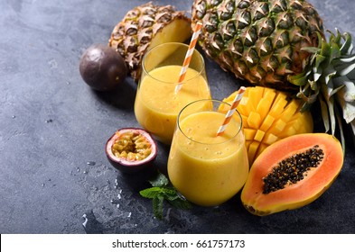 Mango And Papaya Smoothie With Tropical Fruits, Pineapple And Passion Fruit, Exotic Vitamin Drink