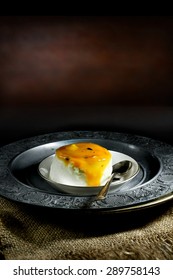 Mango And Passion Fruit Cascade Dessert In A Vintage Setting Against A Dark, Rustic Background. The Perfect Image For Your Wedding Breakfast Or Dessert Menu Cover Design.