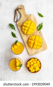 Mango Slices And Cubes With Fresh Mango Smoothie. Top View