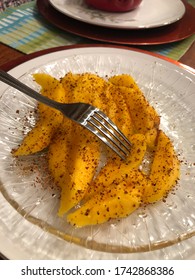 Mango With Tajin Spicy Powder On It