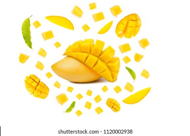 Mango tropical fruit with cubes and leaf flying on isolated white background