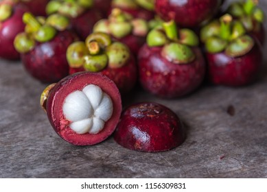 Mangosteen on a wood table is a queen of fruit in Thailand and asia fruit have a sweet can buy at Thai street food and fruit market