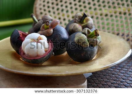 mangosteen queen of fruits on golden plate