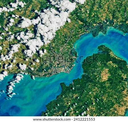 Mangroves Regrow in Iloilo City. The construction of a floodway in this Philippine city was followed by the return of coastal vegetation. Elements of this image furnished by NASA.