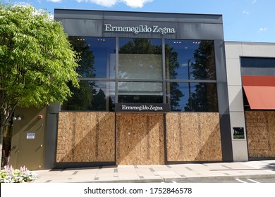 MANHASSET, NEW YORK - JUNE 7, 2020: Ermenegildo Zegna Store Boards Up As A Precaution To Prevent Looting Of The Store In Americana Manhasset, An Upscale, Open-air Shopping Center