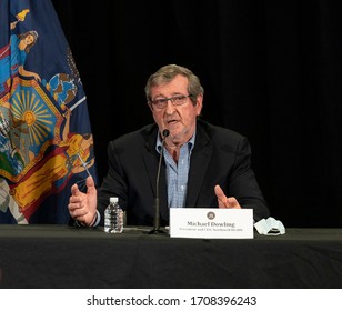 Manhasset, NY - April 19, 2020: President & CEO Michael Dowling Speaks At Governor Andrew Cuomo Daily Briefing To Media On COVID-19 Pandemic At The Feinstein Institute For Medical Research