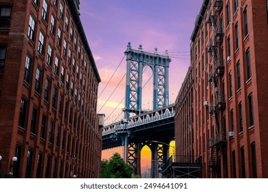 Manhattan Bridge against blue sky as seen from Dumbo Brooklyn