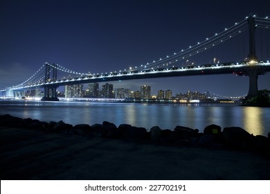 Manhattan Bridge in New York City at night.  View from Dumbo, Brooklyn.