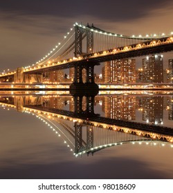 Manhattan Bridge and Manhattan skyline At Night, New York City