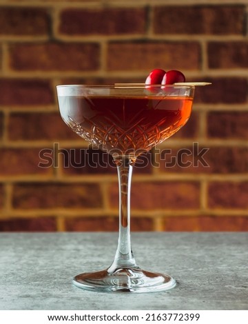 MAnhattan Cocktail served in a coupe glass