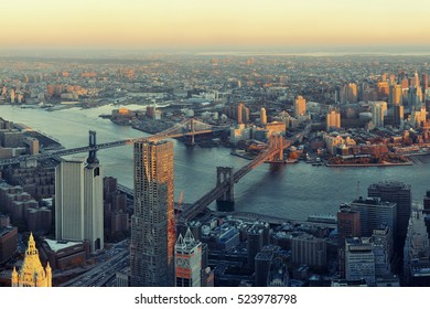 Manhattan Downtown Sunset Rooftop View With Urban Skyscrapers In New York City