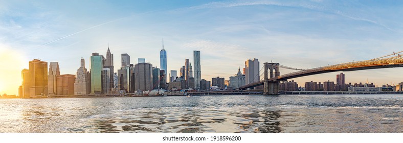 Manhattan Downtown urban view with Brooklyn bridge in sunset - Shutterstock ID 1918596200