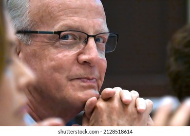 MANHATTAN KANSAS, APRIL 24. 2021
United States Senator Jerry Moran (R-KS) Smiling While Listening To Speakers During The Annual Kansas State Republican Convention  