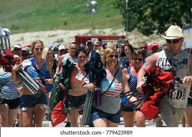 Manhattan, Kansas, USA, 27th June, 2015
Concert Goers Stampede Thru The Gate To Get Front Row Seating At The Annual Kicker Country Stampede Concert At The Tuttle Creek State Park
 