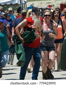 Manhattan, Kansas, USA, 27th June, 2015
Concert Goers Stampede Thru The Gate To Get Front Row Seating At The Annual Kicker Country Stampede Concert At The Tuttle Creek State Park
 