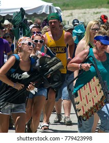 Manhattan, Kansas, USA, 27th June, 2015
Concert Goers Stampede Thru The Gate To Get Front Row Seating At The Annual Kicker Country Stampede Concert At The Tuttle Creek State Park
 